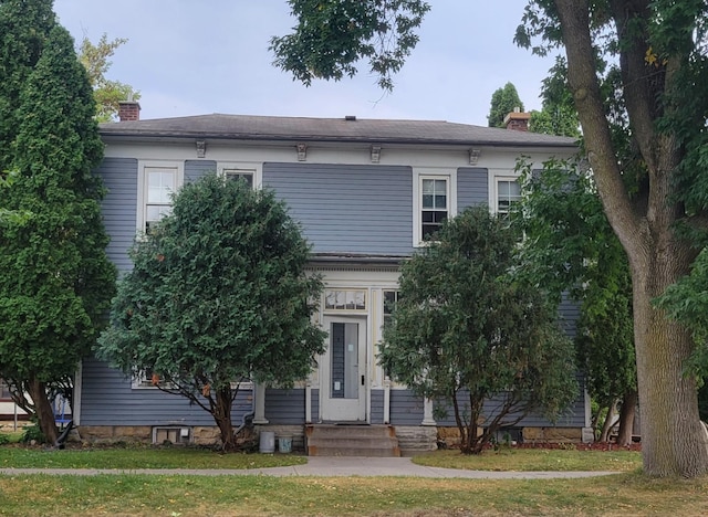 italianate home with a chimney
