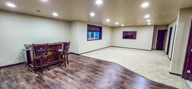 interior space with dark hardwood / wood-style flooring