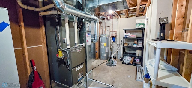 utility room featuring heating unit and electric water heater