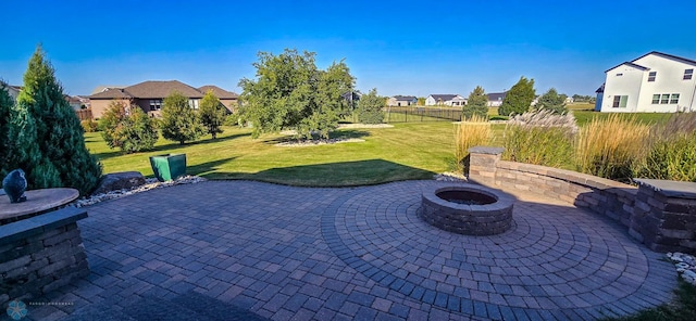 view of patio / terrace with an outdoor fire pit