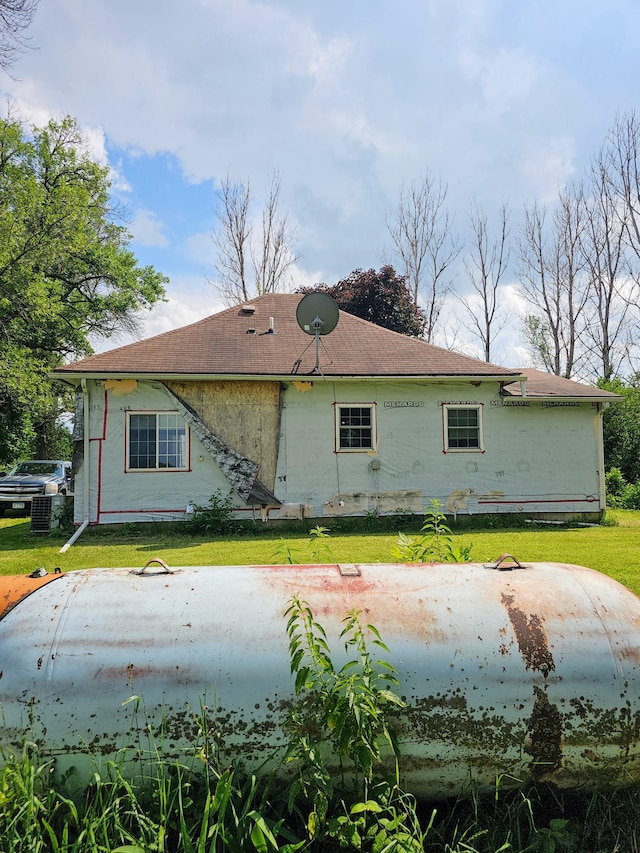 view of home's exterior featuring a lawn