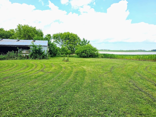 view of yard with a water view