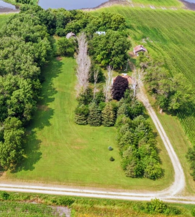 birds eye view of property featuring a rural view