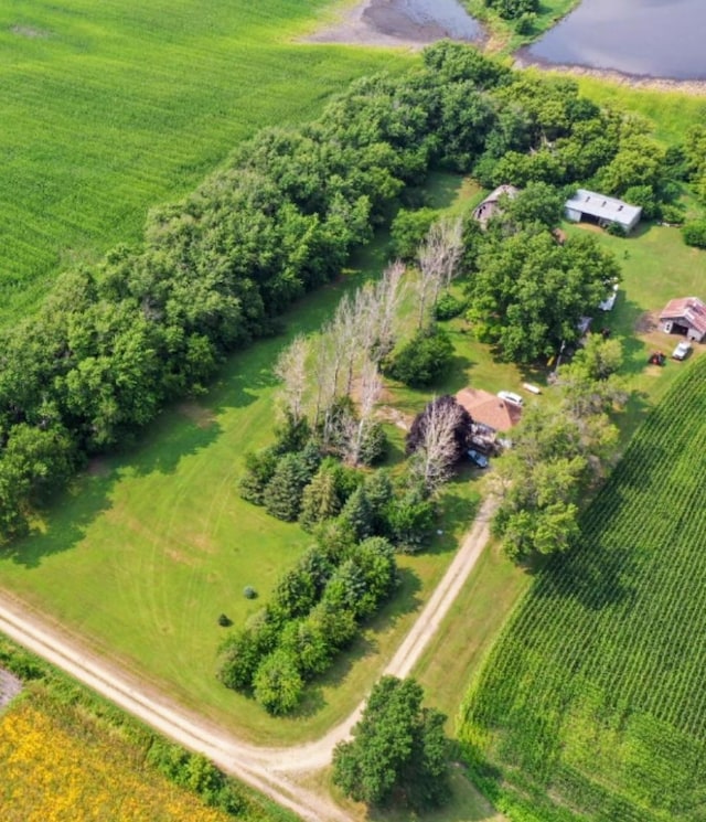 birds eye view of property with a rural view