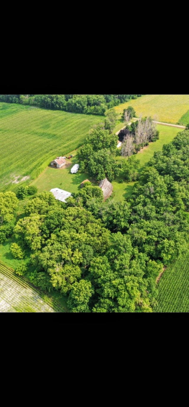 birds eye view of property featuring a rural view