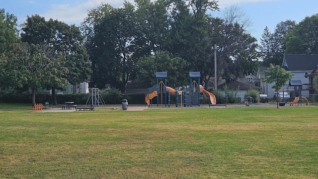 view of playground with a yard