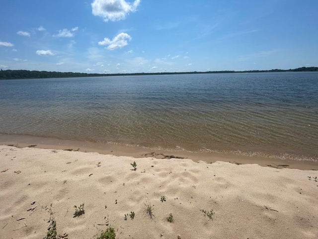 view of water feature featuring a beach view