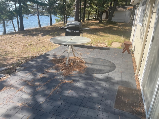 24126 County Road 19, Merrifield, MN 56465 - view of patio featuring a water view