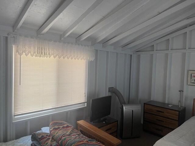 24126 County Road 19, Merrifield, MN 56465 - bedroom featuring lofted ceiling with beams