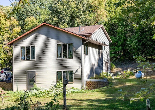 50165 Sailer Rd, Frazee, MN 56544 - view of home's exterior featuring a yard