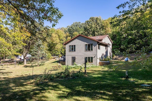 50165 Sailer Rd, Frazee, MN 56544 - view of home's exterior featuring a yard