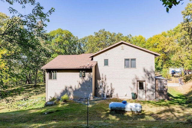 50165 Sailer Rd, Frazee, MN 56544 - rear view of property featuring a lawn