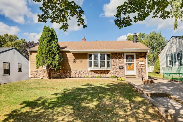 ranch-style house with a front yard