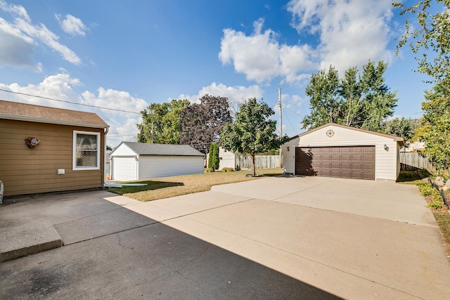 exterior space with an outdoor structure and a garage