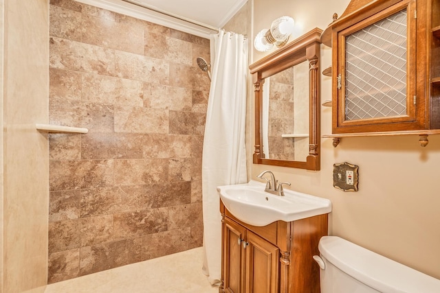 bathroom with curtained shower, crown molding, vanity, and toilet