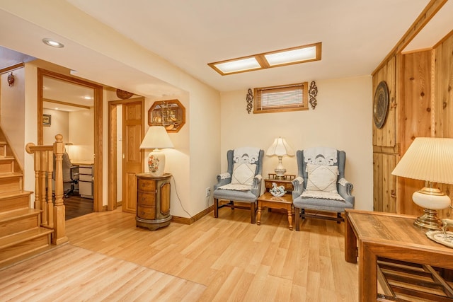 sitting room with light hardwood / wood-style floors