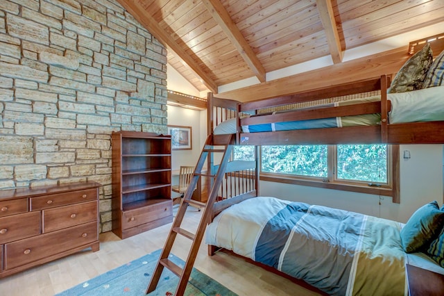 bedroom featuring beamed ceiling, light hardwood / wood-style flooring, high vaulted ceiling, and wooden ceiling