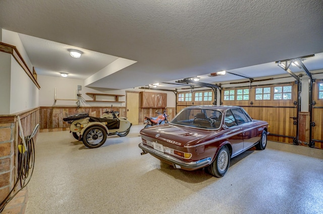 garage with wood walls