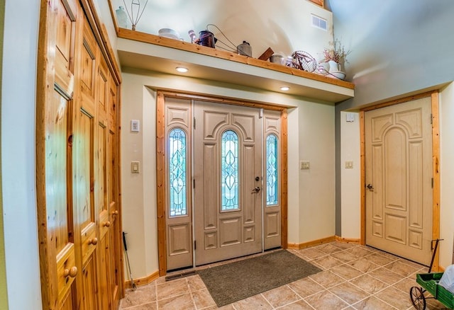 view of tiled foyer entrance