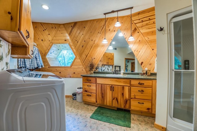 56008 County Road 4, Spring Lake, MN 56680 - laundry area featuring a sink, washing machine and clothes dryer, and baseboards