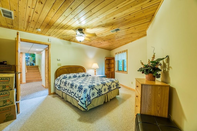 bedroom with ceiling fan, light colored carpet, vaulted ceiling, and wooden ceiling