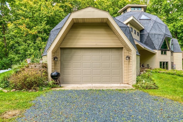 garage with a yard