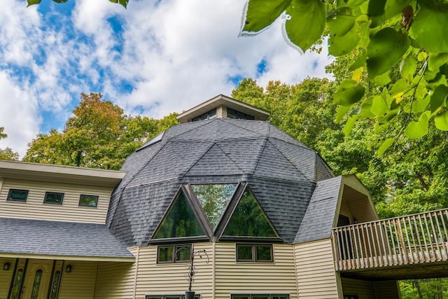 56008 County Road 4, Spring Lake, MN 56680 - view of home's exterior with roof with shingles and a wooden deck