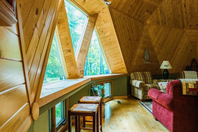 interior space featuring wood walls and hardwood / wood-style floors