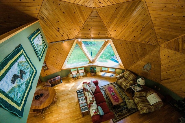 living room featuring wood ceiling and hardwood / wood-style floors