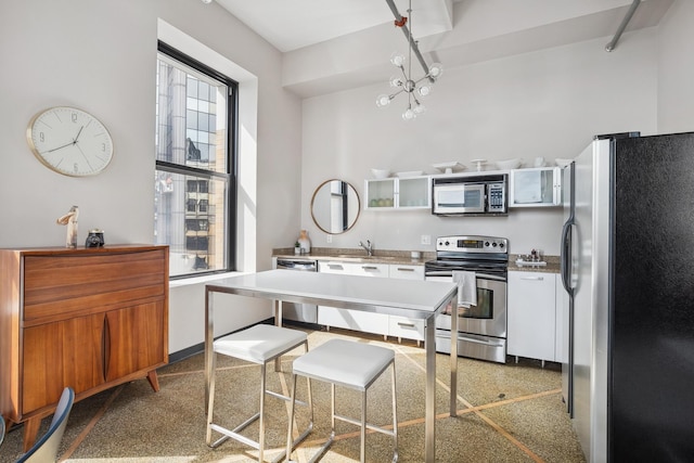 kitchen with appliances with stainless steel finishes and sink