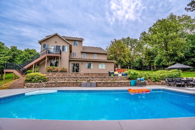 view of pool featuring a patio