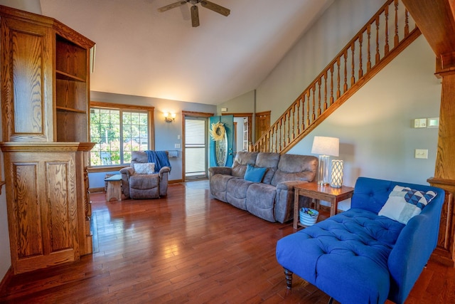 living room with vaulted ceiling, dark hardwood / wood-style floors, and ceiling fan