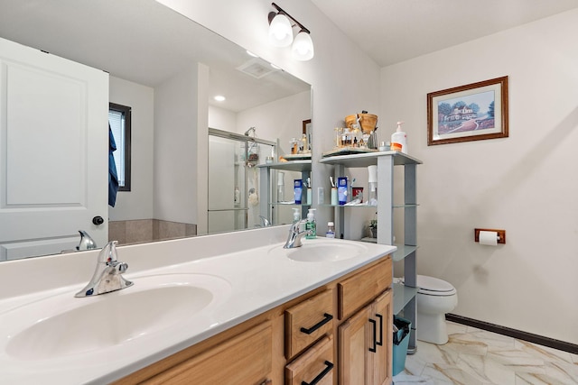 bathroom featuring toilet, vanity, and an enclosed shower