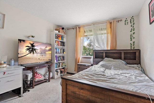 bedroom featuring light carpet