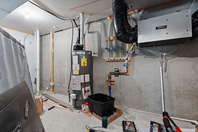 utility room with water heater