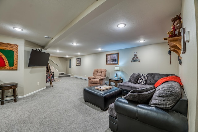 carpeted living room featuring a textured ceiling and baseboard heating