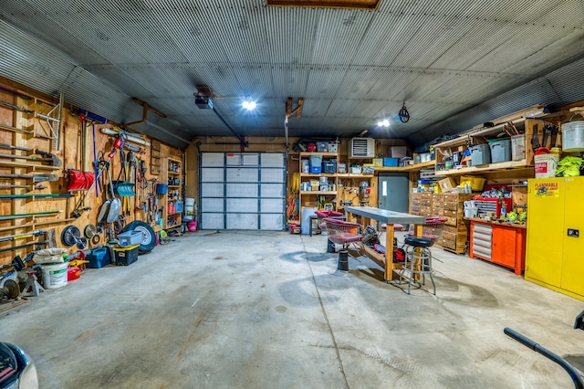 garage featuring a workshop area