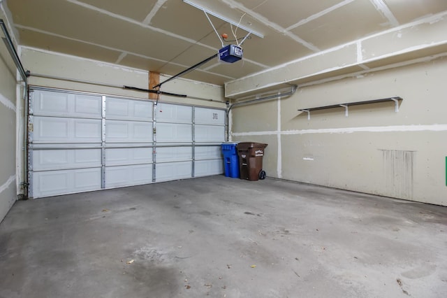 garage featuring a garage door opener