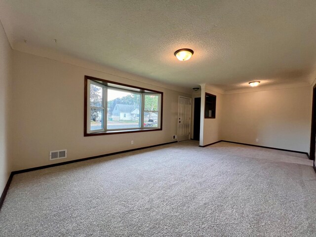 interior space with a textured ceiling