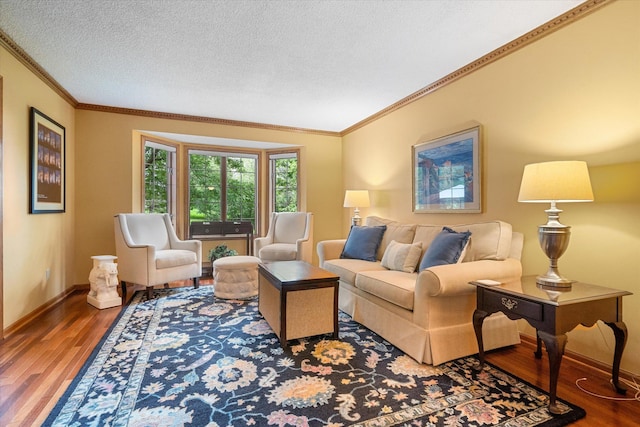 living room with a textured ceiling, crown molding, vaulted ceiling, and hardwood / wood-style flooring