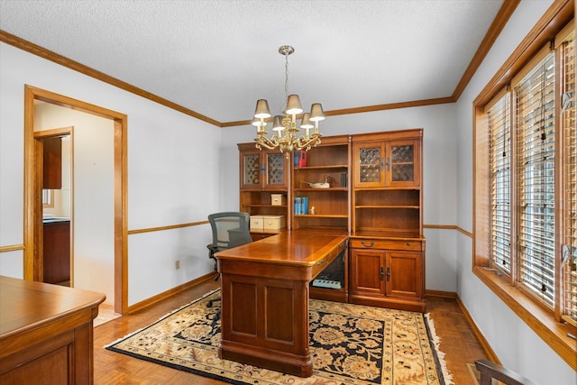 office area featuring a notable chandelier, a textured ceiling, plenty of natural light, and dark parquet flooring