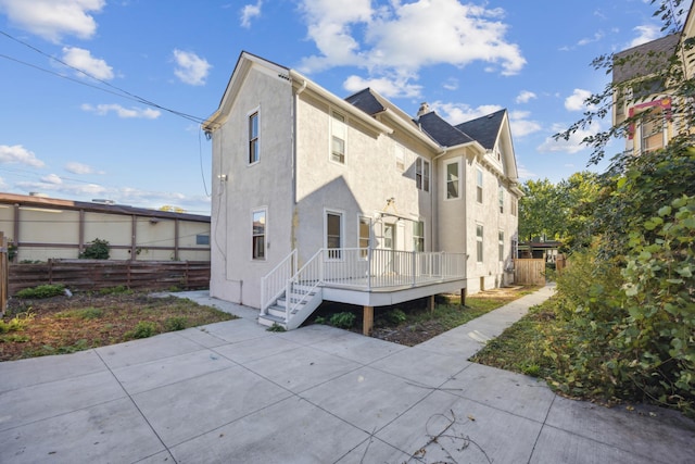 rear view of house featuring a patio area