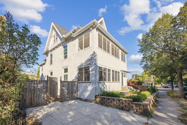 view of home's exterior featuring a patio