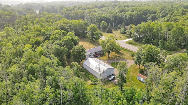 aerial view featuring a view of trees