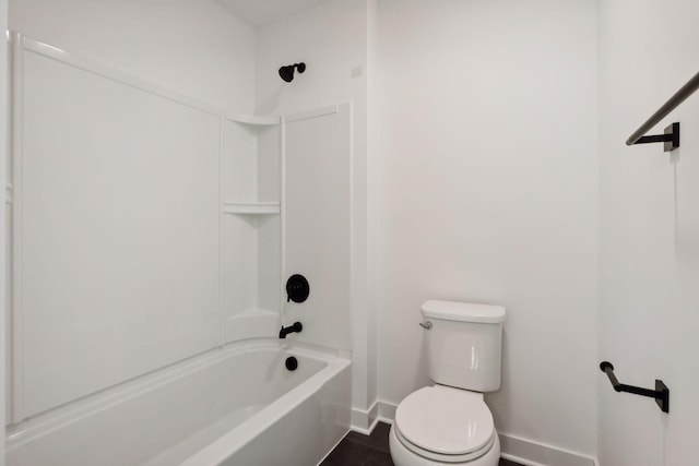 bathroom featuring tile patterned flooring,  shower combination, and toilet