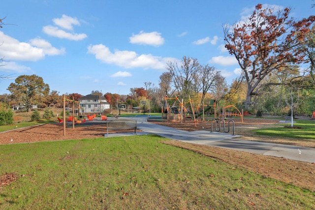 view of playground featuring a lawn