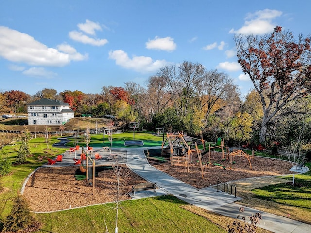 community jungle gym with a yard