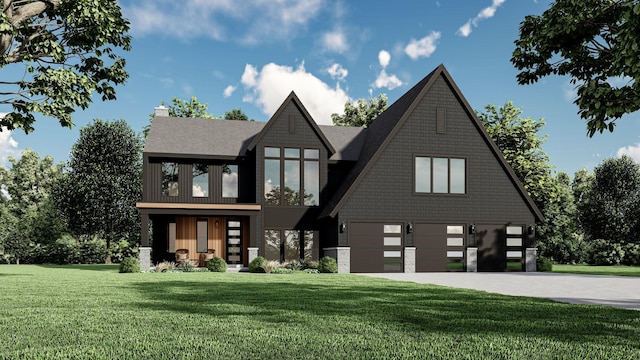 view of front of home featuring a garage and a front yard