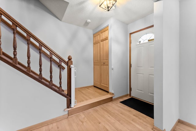 foyer entrance featuring light wood-type flooring