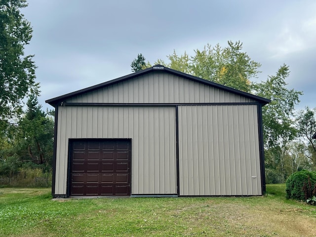 garage with a lawn